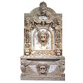 Lion Pond™ - travertine wall fountain